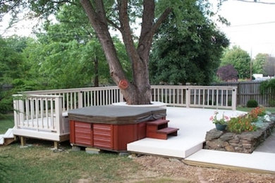 Water fountain deck - mid-sized cottage backyard water fountain deck idea in Other with no cover