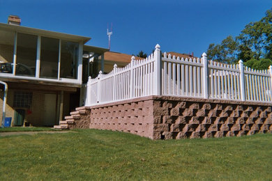 Deck - mid-sized backyard deck idea in Other