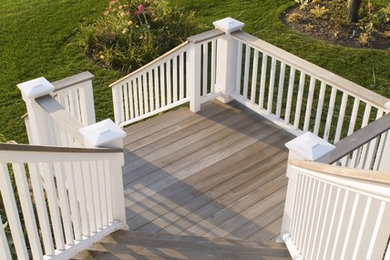 Inspiration for a large timeless backyard deck remodel in Boston with no cover