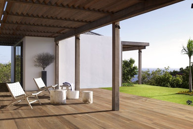Inspiration for a large contemporary backyard deck remodel in San Francisco with a pergola