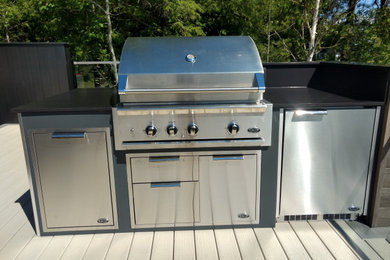 Inspiration for a small contemporary backyard outdoor kitchen deck remodel in Other with no cover