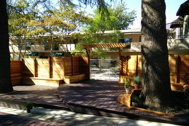 Inspiration for a large transitional side yard deck remodel in Los Angeles with no cover
