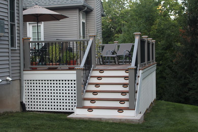 Inspiration for a mid-sized timeless deck remodel in Other with no cover