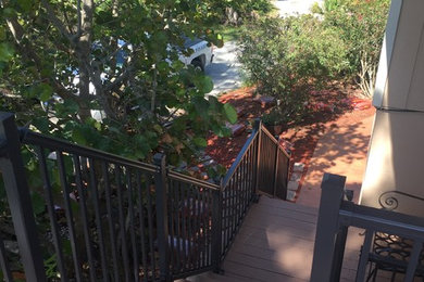 Large elegant backyard deck photo in Tampa