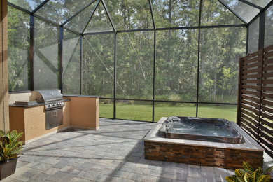 Photo of a traditional terrace in Jacksonville with an outdoor kitchen.