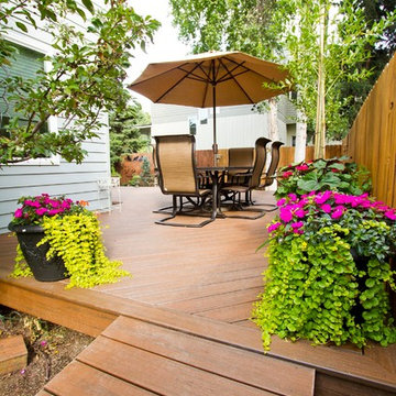 Outdoor Living Spaces Created from Angled Front Deck and Back Decks