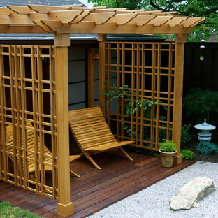 Deck - backyard deck idea in New York with a pergola