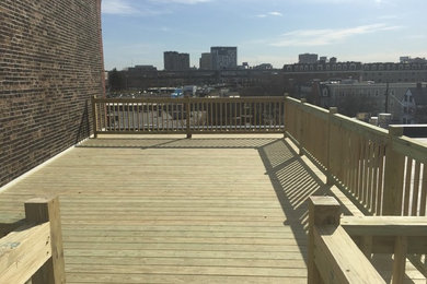 Deck - large industrial rooftop deck idea in Phoenix with no cover