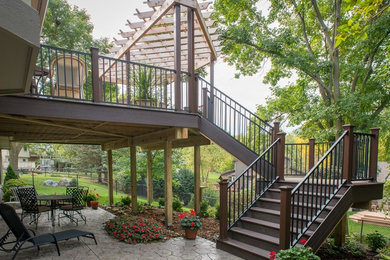 Photo of a medium sized classic back terrace in Minneapolis with a pergola.
