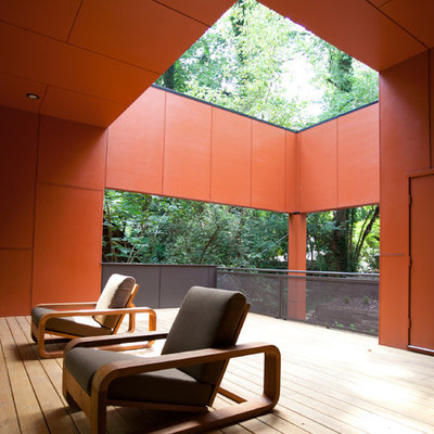 Deck - modern deck idea in Atlanta with a roof extension