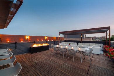 Photo of a contemporary roof rooftop terrace in Toronto with a bar area and feature lighting.