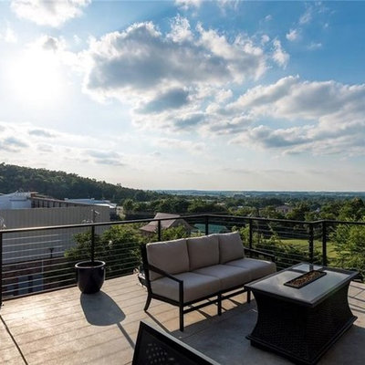 Inspiration for a mid-sized modern rooftop outdoor kitchen deck remodel in Other with no cover