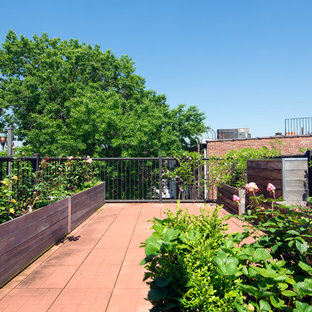Deck container garden - large traditional rooftop rooftop deck container garden idea in New York with no cover