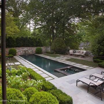 Peachtree battle lap pool with submerged spa and water feature