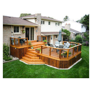 Perfect home living extension - two tiered cedar deck - Traditional ...