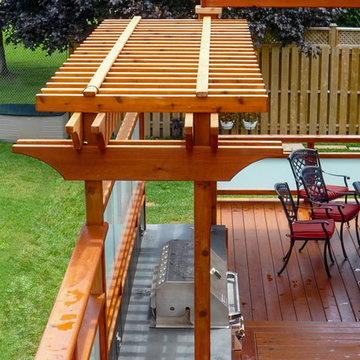 Pergola with shade awning, deck, and barbecue area