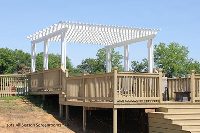 Deck - backyard deck idea in Other with a pergola
