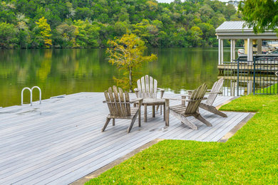 Inspiration for a large contemporary backyard dock remodel in Austin with no cover