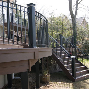 Piano deck -  Round Azek deck with with custom rails a view