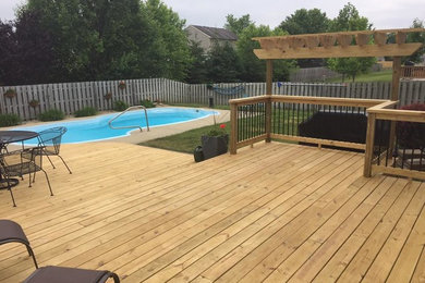 Inspiration for a huge backyard deck remodel in Indianapolis