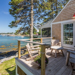 Beach style side yard deck photo in Portland Maine with no cover