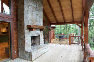 Example of an arts and crafts deck design in Charlotte