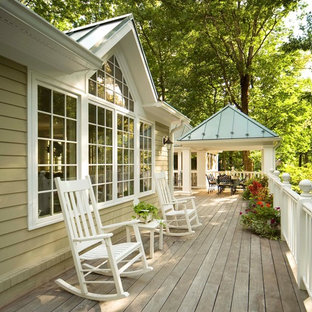Example of a mid-sized classic backyard deck design in DC Metro with no cover