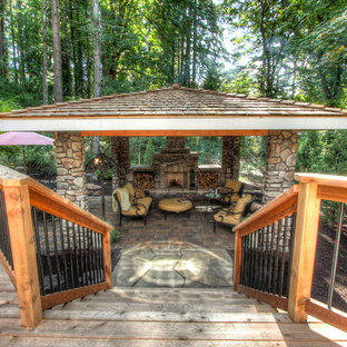 Mountain style deck photo in Portland with a fire pit