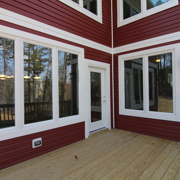 Red House with Backyard Deck