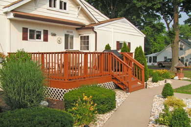 Example of a small classic backyard deck design in Philadelphia with no cover