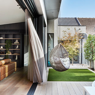 This is an example of a contemporary deck in Melbourne.