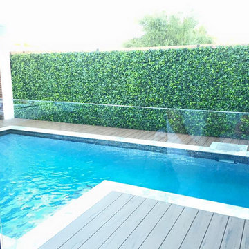 Replicate a living green wall by a pool