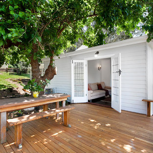 Inspiration for a country backyard deck in Wollongong with no cover.