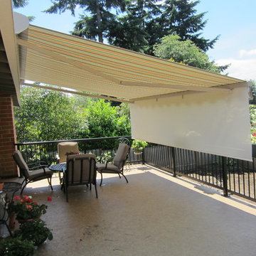 Retractable awning with drop screen