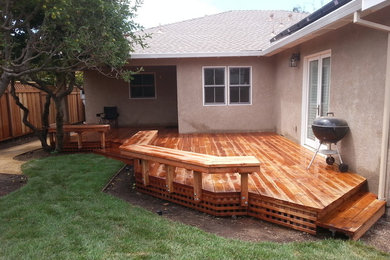 Deck - mid-sized traditional backyard deck idea in San Francisco with no cover