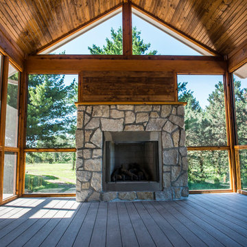 Screened deck with fireplace