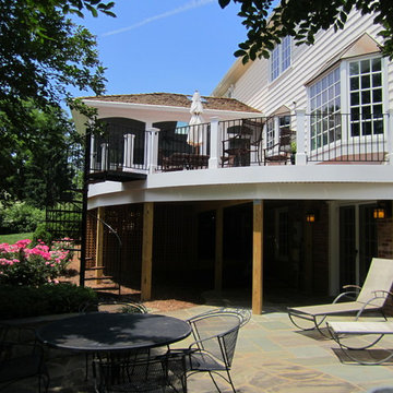 Screened Porch, Wood Deck, Wrought Iron Spiral Staircase, and Flagstone Patio