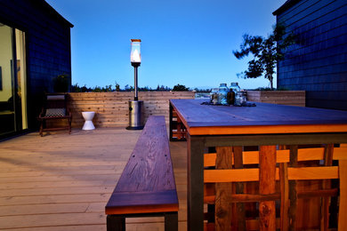 Inspiration for a rustic deck remodel in Portland with no cover