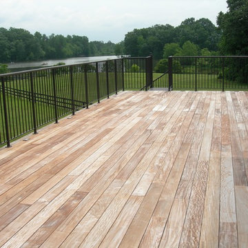 Showstopping Spiral Deck Stair and Rail for Lakefront Deck