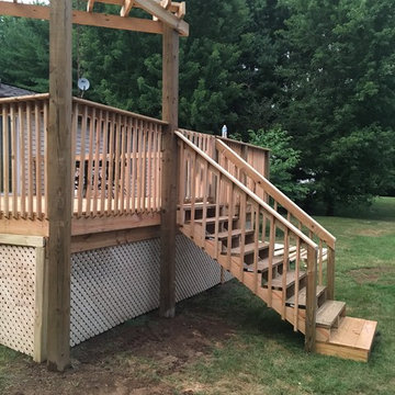 Small deck and decorative pergola; customer request for lattice.