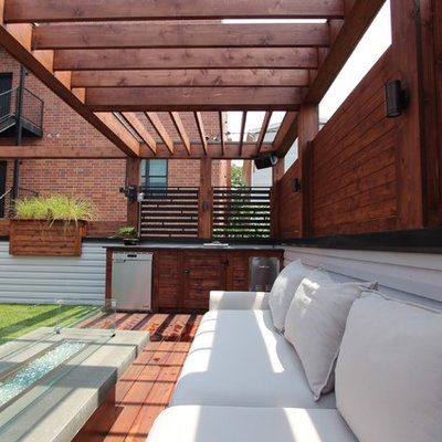 Outdoor kitchen deck - mid-sized modern rooftop outdoor kitchen deck idea in Chicago with a pergola