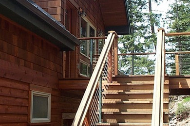 Example of an arts and crafts deck design in Seattle