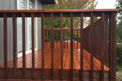 Inspiration for a timeless backyard deck remodel in Portland