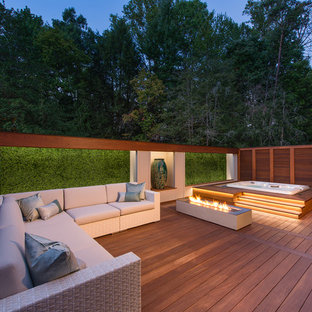 Mid-sized transitional deck photo in DC Metro with a fire pit and no cover