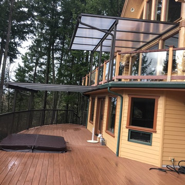 The deck and awnings blend seamlessly into the house