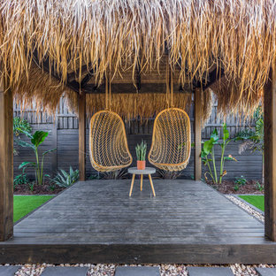 Contemporary backyard deck in Brisbane.