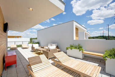 Inspiration for a contemporary rooftop rooftop deck remodel in Austin