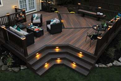 Large trendy backyard deck photo in New York with no cover