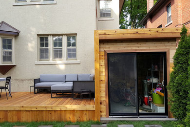 Deck - mid-sized contemporary backyard deck idea in Toronto