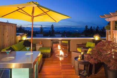Deck - small contemporary rooftop deck idea in Vancouver with a fire pit and no cover